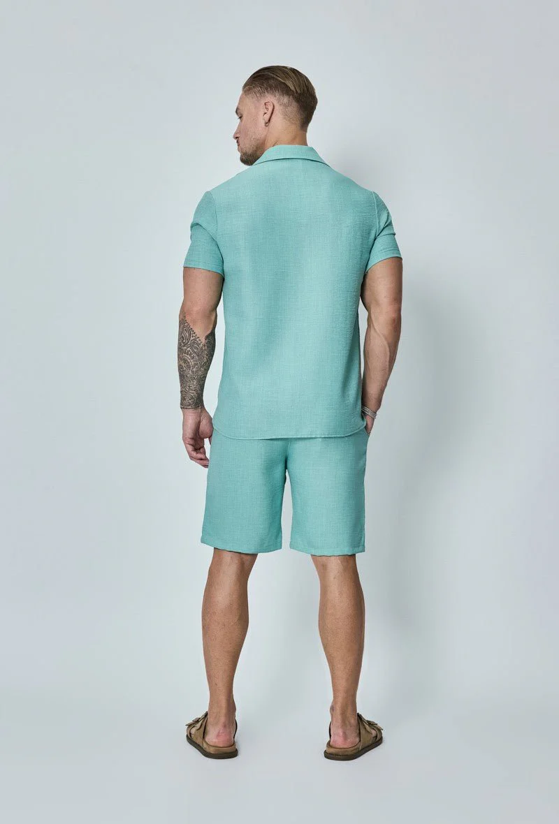 Chemise manches courtes à bouton - Image 15