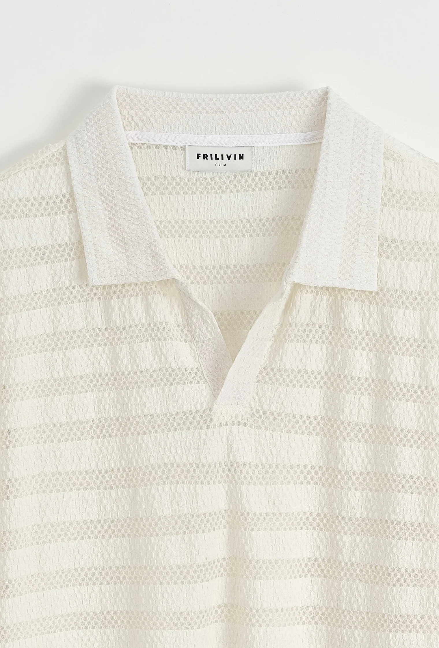 Polo à rayures - Image 7