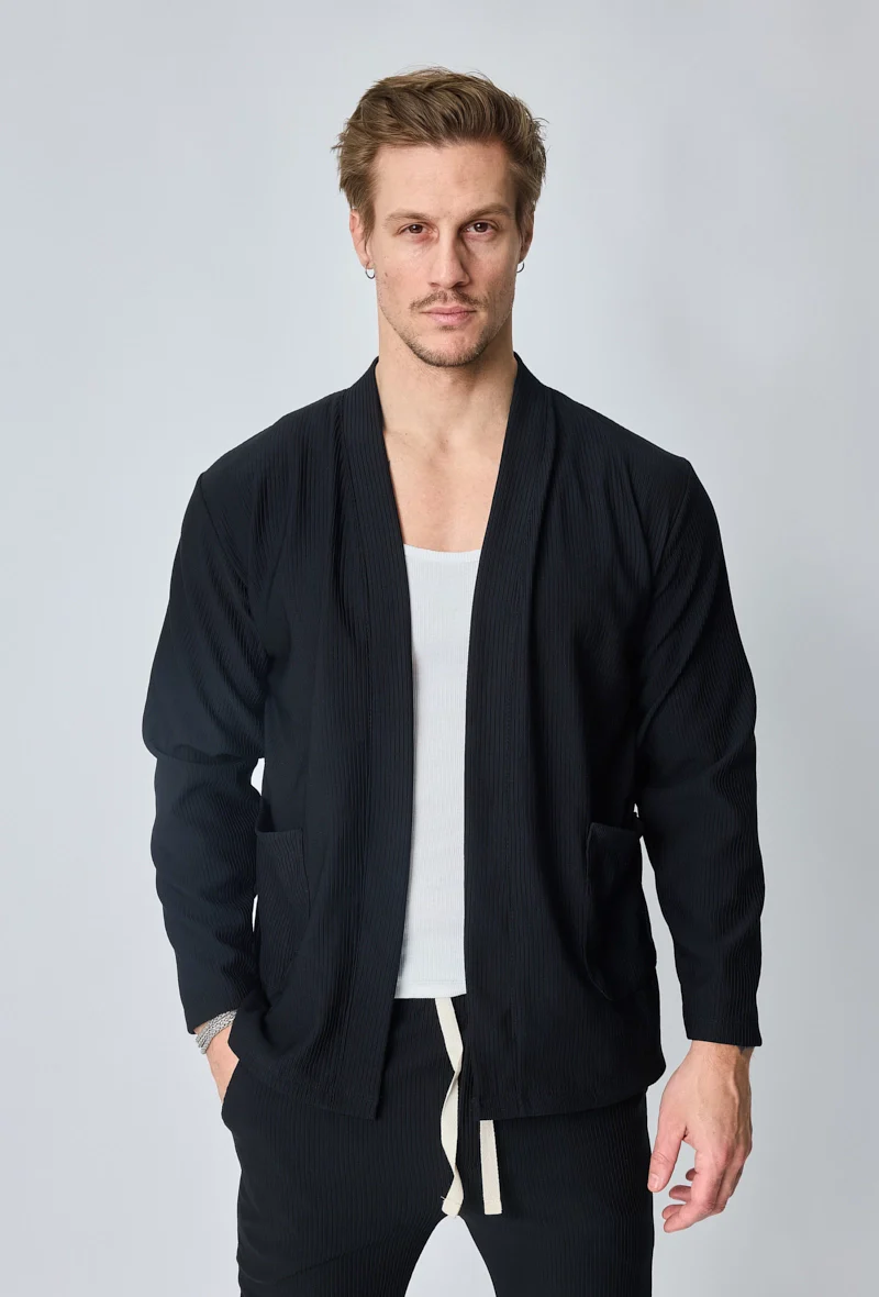 Veste uni fluide confortable avec motif à rayures